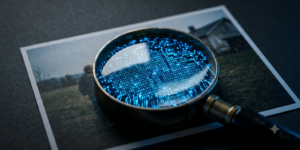 magnifying glass on a photo looking for stego evidence