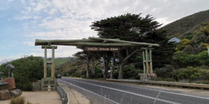 The Great Ocean Road entrance sign, photographed as an ordinary holiday snapshot